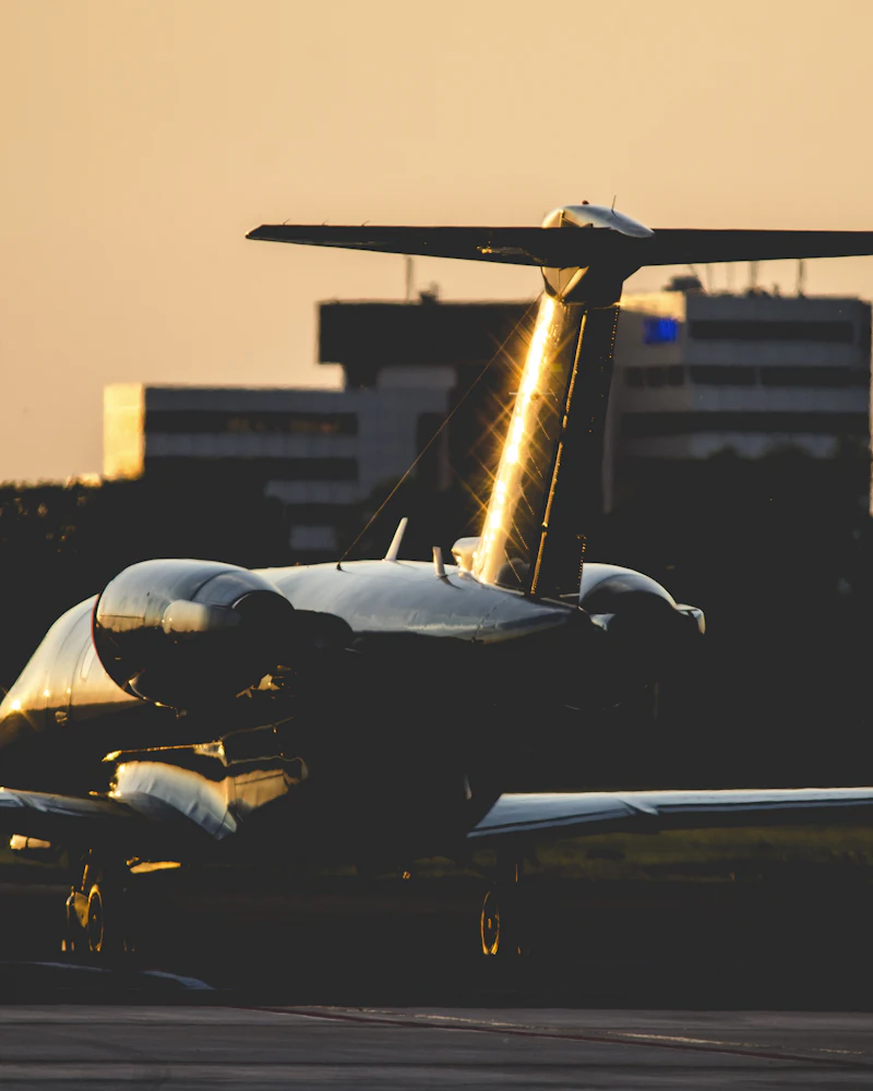A private jet on the apron at dusk